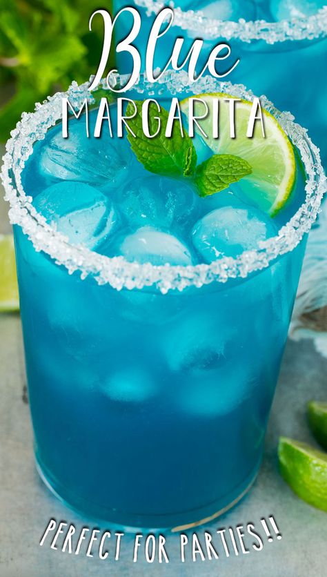 This blue margarita is tequila, blue curacao, lime juice and agave syrup, all shaken together to form a beautiful and unique cocktail. Blue Margaritas, Blue Margarita Recipe, Kawaii Drinks, Cocktail Corner, Easy Drinks To Make, Boat Drinks, Wine Cupcakes, Blue Margarita, Tropical Cocktails