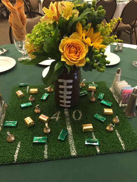 Edison football banquet, mason jar football with turf centerpieces Turf Centerpieces, Football Banquet Centerpieces, Football Centerpieces, Football Themed Party, Banquet Centerpieces, Cheer Banquet, Football Banquet, Football Wedding, Sports Banquet