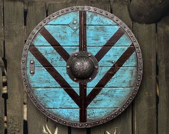 Shields Axes Paintings and Sculptures by HyperealismPaintings Shield Knight, Escudo Viking, Warrior Shield, Arte Viking, Viking Medieval, Viking Battle, Wooden Shield, Viking Shield, Shield Maiden