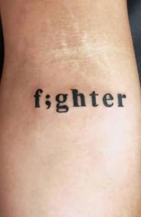 F;ghter Tattoo, Word Tattoo With Semi Colon, Tattoo Ideas Fighter, Dark Tattoos With Meaning, Strength And Semi Colon Tattoo, Second Life Tattoo, Tattoo Ideas For Anger Issues, Rist Tattoo For Men, Tattoos About Hope