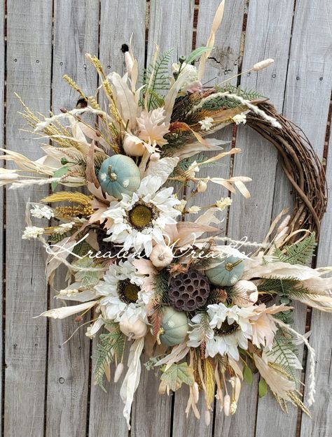 "Fall Harvest Wreath Cream and Teal Fall Sunflower Pumpkin Door Wreath with Wheat and Lotus Stems Nuetral Thanksgiving Autumn Pumpkin Wreath -Adorn your home this Fall season with this beautiful Wreath. Our Teal and Cream Fall Sunflower Pumpkin Wreath is the perfect statement piece to spruce up your front door, entry way, or any empty wall space in your home. It features an 18\"grapevine wreath base with soft beautiful Fall stems, and greenery.  Dimensions: 35\" × 28\" × 8\" OUR GUARANTEE.... Th Unique Fall Wreath, Elegant Fall Wreaths, Fall Decor Wreaths, Floral Door Wreaths, Fall Grapevine Wreaths, Harvest Wreath, Door Wreaths Fall, Brown Tone, Pumpkin Wreath