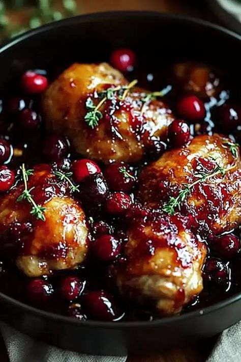 Cranberry-Glazed Chicken: Tender, juicy chicken with a sweet-tangy cranberry glaze—perfect for cozy dinners! Try it tonight! Maple Cranberry Chicken, Cranberry Orange Chicken Thighs, Chicken Pomegranate Recipes, Orange Cranberry Chicken, Cranberry Sauce Chicken, Cranberry Glazed Chicken, Chicken Christmas Recipes, Christmas Dinner Ideas Chicken, Cranberry Chicken Baked