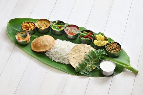 Photo about Meals served on banana leaf, traditional south indian cuisine. Image of healthy, papad, curry - 57371330 Chennai Travel, Food Biryani, Kerala Cooking, Indian Catering, South Indian Restaurant, South India Tour, Indian Food Photography, Restaurant In London, Ayurvedic Diet