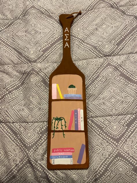 Alpha Sigma Tau Paddles, Taylor Swift Sorority Paddle, Painted Paddles Ideas, Paddle Sorority Ideas, Big Little Sorority Paddles, Paddle Painting Ideas, Paddles Sorority Ideas, Big Little Paddles Sorority Ideas, Aoii Paddle