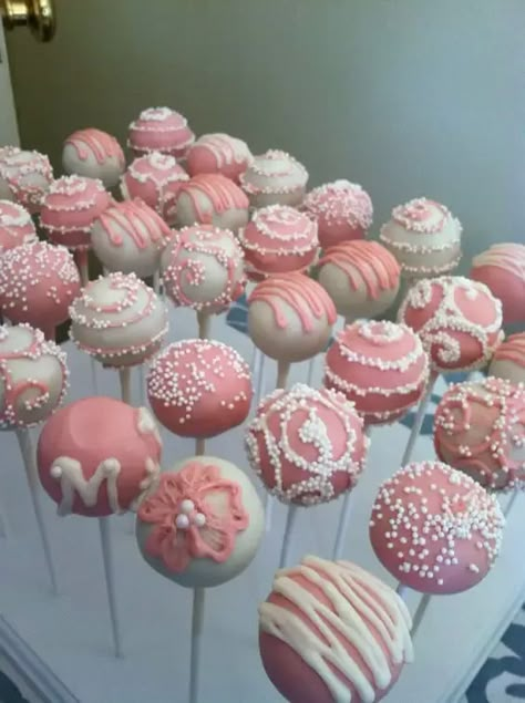 35+ Genius DIY Baby Shower Ideas for Girls - HubPages Cake Pops For Valentines Day, Pink And White 21st Birthday Decor, Pretty Pink Desserts, Pink Sweet Treats, Pink Desserts Aesthetic, Pink Cake Pops Ideas, Cute Baking Ideas Aesthetic, Pink Birthday Treats, Pink Cake Pops Birthday