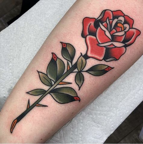 Rose Tattoo Traditional, Rose Stem Tattoo, American Traditional Rose, Traditional Rose Tattoo, Single Rose Tattoos, Tato Tradisional, Rose Tattoo On Arm, Name Tattoos On Wrist, Traditional Tattoo Inspiration