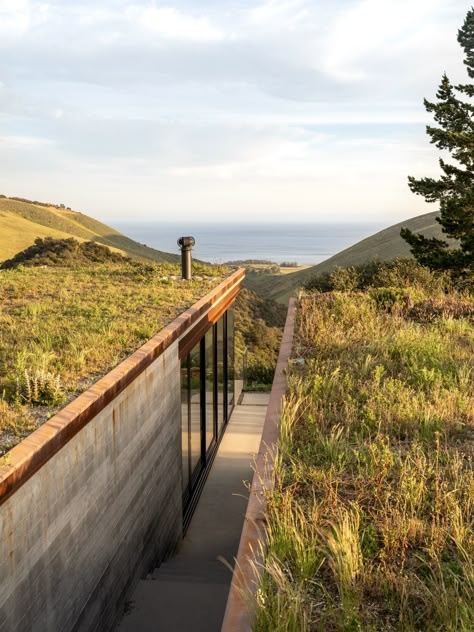 Rooted in Nature – Off-Grid House by Anacapa Architecture • Designed as a summer house near the homeowners’ main residence, Off-Grid House is a sensitively designed dwelling that serves to elevate the ecology of the verdant California ranch it inhabits. Anacapa Architecture mitigates the impact of the build by bringing the home into equilibrium with the landscape. #offgridhomes #amazinghomes #californiahomes #coastalhomes #hilltophomes #architecture #dreamhome #mountainhomes House In The Hills, Mike Kelley, Off Grid House, Central Coast California, California Ranch, Living Roofs, Modern Lighting Design, The Local Project, Passive House