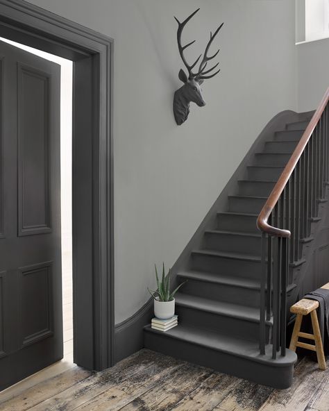 How fab is this grey hallway? We love the combination of the darker woodwork and the pale walls. #hallway #stairs #grey #realhomes Grey Hallway, Gray Stairs, Hallway Paint, Victorian Hallway, Stairs Landing, Painted Staircases, Hallway Colours, Dark Hallway, House Staircase