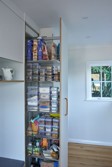 Organised and out of site. Behind these doors a pull-out pantry and a laundry have found a home. What do you prefer? A pull-out pantry, or individual pantry drawers behind a door? Both solutions have their pro's and con's, so there are no wrong answers, just personal preference. #pantry #laundry #plywood Narrow Pantry Cupboard, Plywood Pantry, Pull Out Pantry Organization, Prep Kitchen Pantry, Narrow Pantry, Walker House, No Pantry Solutions, Pull Out Pantry, Pantry Drawers