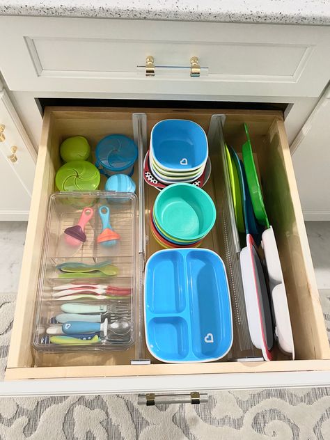 Kids Kitchen Drawer, Organizing Baby Kitchen Items, Bottle Drawer Organization, Kids Plate Storage, Kids Kitchen Drawer Organization, Kids Cabinet Organization, Toddler Plates Organization, Kids Kitchen Organization Ideas, Kitchen Table Organization