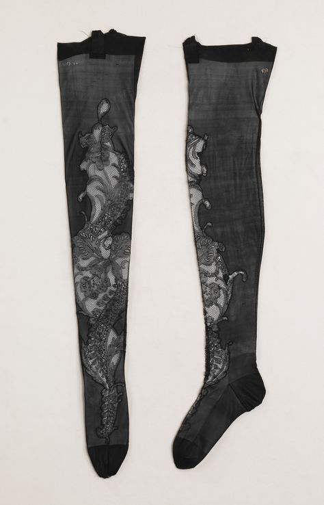 Stockings: ca. 1900-1910, French, silk. "Known for her striking looks and elegant clothing, de Acosta Lydig built a wardrobe that featured numerous lace-trimmed garments, including underwear and accessories like these. The custom quality shows in the silk ribbon garter loops and the embroidery of the owner's name on each stocking, while the seductive aspect of the pair is heightened by their color and the placement of the scrolling lace insets." 1900's Fashion, 1900s Fashion, Lace Stockings, Vintage Stockings, Historic Fashion, Edwardian Style, Silk Stockings, Tights Socks, History Of Fashion