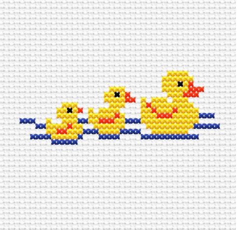 Rubber Duck Family - Easy Cross Stitch Pattern Dive into the world of cute rubber ducks with our adorable cross stitch pattern. This simple x stitching pattern features a tiny motif that is perfect for beginners looking to try their hand at DIY decorations. The minimal design makes it ideal for needlepoint enthusiasts of all skill levels.  Aida: 14 count ( 5,5 per cm) Pattern Size: 38 x 14 stitches Finished Size: 2,7 x 1,0 inches ( 7 x 3 cm ) This is a DIGITAL INSTANT DOWNLOAD. No physical item Mini Cross Stitch Patterns Free Charts, Easy Cross Stitch Patterns For Beginners Free, Cross Stitch Pattern Simple, Duck Family, Stitched Cards, Mini Embroidery, Tiny Cross Stitch, Easy Cross Stitch Patterns, Flower Cross