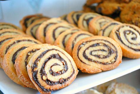 Pecan Disco Whirls. A swirl of brown sugar, milk and cocoa with some chopped walnuts mixed in gives these cookies a distinctive look that will look fabulous on any cookie swap table | What's Cookin, Chicago? Lemon Caper Chicken, Brown Sugar Milk, Bread Pudding With Apples, My Sister In Law, Parmesan Crisps, Holiday Countdown, Holiday Eating, Vanilla Bean Ice Cream, Chicago Food