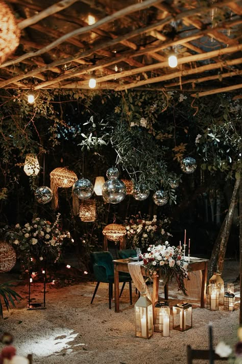 Fun outdoor destination wedding tablescape with green and pink colour theme with disco balls overhead and natural lush greenery of jungle setting in Tulum, Mexico Dark Green And Pink Wedding Decor, Dark Disco Wedding, Dark Green And Pink Wedding, Mayan Wedding, Disco Ball Decorations, Disco Ball Decor, Pink Colour Scheme, Spooky Dinner, Beachfront Wedding