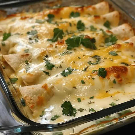 Dive into the comforting flavors of these creamy chicken enchiladas, filled with a cheesy chicken mixture and topped with a rich, sour cream-based sauce. This recipe is perfect for a satisfying family dinner or a casual gathering. Ingredients: Instructions: Step 1: Prepare and Assemble the Enchiladas Step 2: Prepare the Creamy Sauce Step 3: Assemble […] Cheesy Chicken Enchiladas With Creamy Sauce, Sour Cream Chicken Enchilada Recipe Joanna Gaines, Sour Cream Chicken Enchilada Recipe Easy, Sour Cream Enchiladas Chicken, Chicken Enchiladas With Sour Cream Sauce, Sour Cream Sauce For Enchiladas, Amazing Enchiladas, Chicken Enchiladas With Green Sauce, Sourcream Chicken Enchiladas