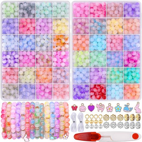 PRICES MAY VARY. 🎃Great Value Set: Wuollgess 8 mm beads for bracelets include more than 1200 pieces of 8mm glass beads with holes in 48 vivid colors,25 bracelet beads per color,190 pcs gold spacer beads, 190 pcs silver spacer beads, 8pcs charm pendants, 2pcs crystal elastic strings and scissors, enough quantity to meet your various needs of jewelry making or DIY craft. 🎄48 Colors Gradient Glass Bead Kit: This bracelet making kit glass beads includes 48 different colors 8 mm beads which can be Crystal Jewelry Making Kit, Crystal Bracelet Making Kit, Bracelet Making Kit Beads, Bracelet Kit Aesthetic, Bead Kits Jewelry Making, Glass Beaded Bracelets Diy, Glass Beads Bracelet Ideas, Small Business Ideas Products, Melted Pony Beads