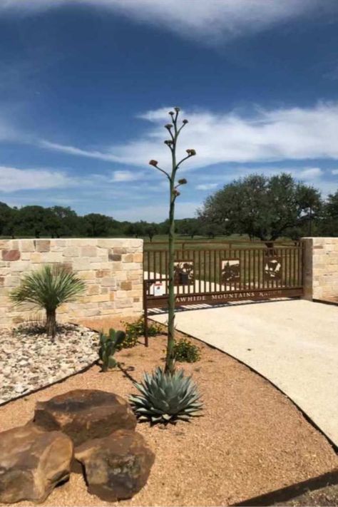 Sliding Ranch Gate, Rancho Gates With Last Name, Ranch Flower Beds, Ranch Style Driveway Entrance, Ranch Gate Entrance Ideas, Western Curb Appeal, Ranch Front Gate Entrance, Front Gate Entrance Landscaping Ideas, Texas Ranch Landscaping Ideas