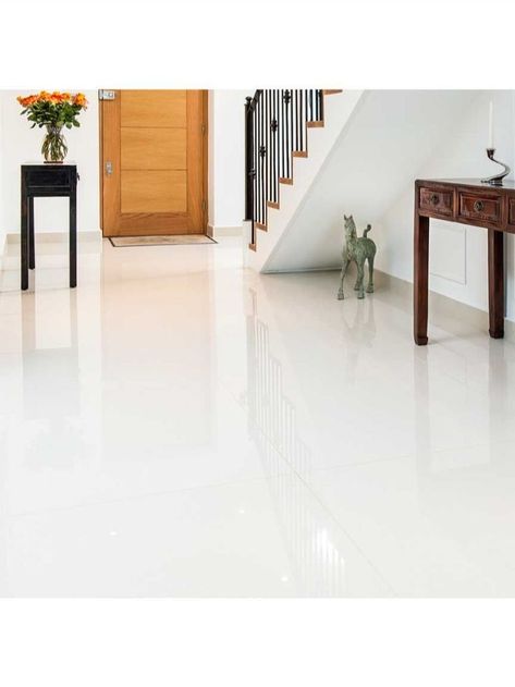 ceremic floor tiles - difference between porcelain and ceramic floor tiles: which is better? floor tiles price and design at al mansoor traders | floor tiles design. modern living room floor tiles design | ceramic floor tiles colors | bedroom vitrified floor tiles. how to install floor tile -  using ceramic tiles.  wooden floor tiles with ceramic floor tiles. White Porcelain Tile Floor Living Room, Porclein Floors, Tiles Floor White, White Floor Tiles Living Room, White Floor Living Room, White Tiles Living Room, Tiles For Living Room Floor, Tile Wood Flooring, White Floor Tiles