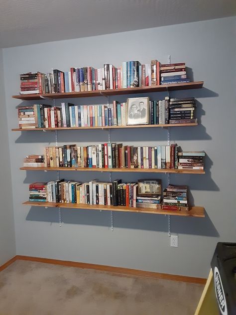 1x10x6 shelves on single track standards mounted to the studs Track Shelving Bookshelves, Track Shelving Ideas, Bookshelf Goals, Track Shelving, Workshop Projects, Nook Ideas, Cozy Home Office, Wall Bookshelves, Book Shelves