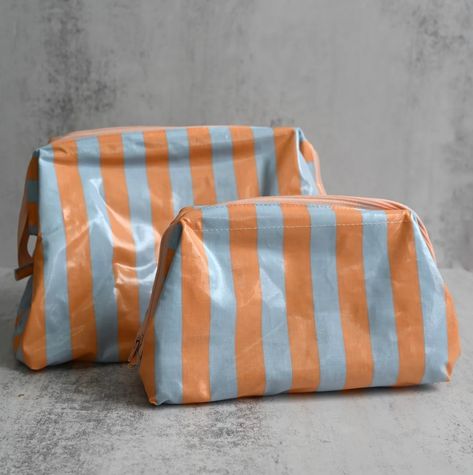 Something sunny for the weekend.. 🍑 Our bestselling machine washable striped wash bags are ALMOST sold out in all the colourways.. we’ve got a few of our fav sweet and fruity Peach & Sky Blue in both medium and large left! 🍑 These vintage-inspired wash bags are made in Denmark and inspired by mid century Italian luggage, with a contrasting lining and structured suitcase style silhouette (they stand up on their own so no more scrabbling) plus they are actually GENUINELY machine washable! Sham... Stylish Luggage, Zsa Zsa, Green Bubble, Holiday Essentials, Pink Sand, Wash Bag, Pink Stripes, Wash Bags, Blue Bags