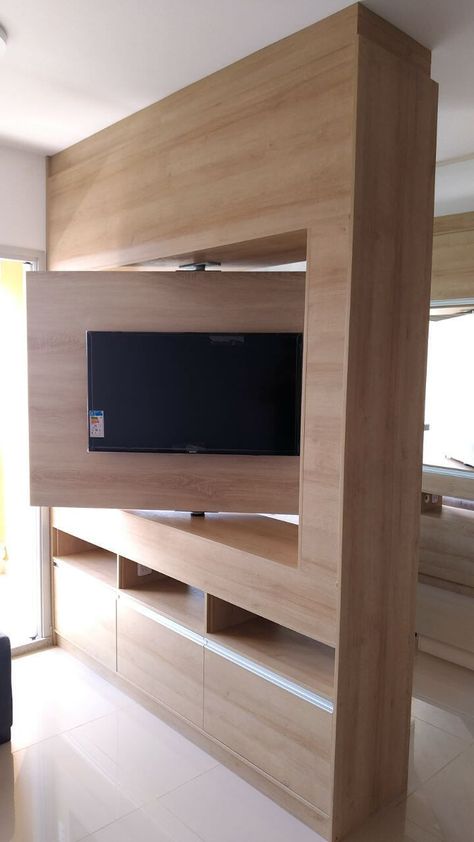 Elegant Rotating TV Stand Design IdeasYou’ll Love - Engineering Discoveries Living Room Separator, Rotating Tv Stand, Room Separator Ideas, Tv Stand Room Divider, Rotating Tv, Living Room Separator Ideas, Creative Room Dividers, Modern Partition, Modern Partition Walls