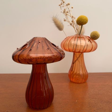 Add a touch of whimsical charm to any space with our beautiful glass mushroom vases 🍄 #mushroom #mushrooms #mushroomcore #vase #vases #flower vase #flowervase #flowervases #mushroomgifts #mushroomgift #mushroomgifting Mushroom Vase Ceramic, Mushroom Vase, Mushroom Core, Instagram Add, Vase Ceramic, Glass Mushrooms, Year 1, Flower Vase, Flower Vases