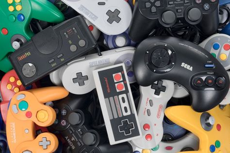 Taipei, Taiwan - February 19, 2018: A pile of retro video game controllers shot from above. Atari 5200, Nes Controller, Nintendo Sega, Nes Games, Atari 2600, Classic Video Games, Game Controllers, 8 Bits, Video Game Controller