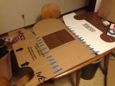 Making a Cardboard Mario Kart Frame: 20 Steps Cardboard Mario Kart, Piñata Cars, Mario Kart Costumes, Mario Kart Party, Cardboard Box Car, Super Mario Bros Birthday Party, Cardboard Car, Mario Birthday Party, Cardboard Frame