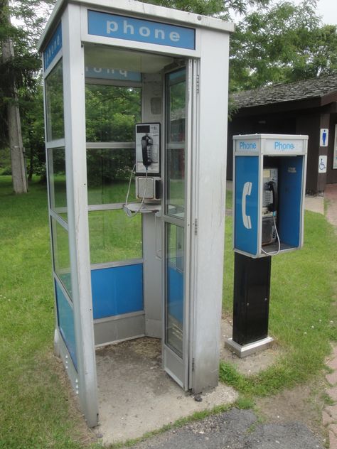 Last week, at a rest area along I-87, far north in upstate New York, I encountered this anachronistic scene.  It was like stumbling into some exhibit at the Museum of Modern American Culture. I can... Pay Phone Booth, 80s Phone, Amish Traditions, Antique Phone, American Pay, Phone Charger Holder, Telephone Booth, Rotary Phone, Phone Booth