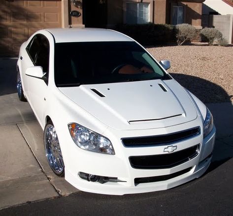 This is another one of the modified malibu's. It looks great with the lip body kit, rims and the customized hood. Car looks great from the f... Chevy Cruze Custom, 2011 Chevy Malibu, Pimped Cars, Malibu Car, Caprice Ppv, 2012 Chevy Malibu, Cars Chevrolet, Malibu Lt, Chevrolet Corsa