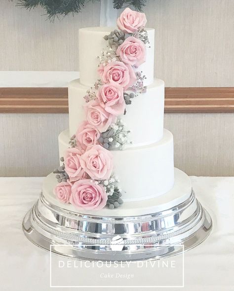 A three tier traditional wedding cake with flower cascade. Completed with real flowers in a grey and blush pink colour scheme. This cake was gifted as via the 'Gift of a wedding' charity, who help those with terminal illness. The real flowers to add to the natural but polished finish. Made for a November wedding but perfect any time of the year. Contact me now for more information on your wedding cake. for all you Warwickshire, Leicestershire, Coventry and Grey And Pink Wedding Cake, Pink And Grey Wedding Ideas, Wedding Cake Pink Flowers, Grey And Pink Wedding, Pink And Gray Wedding, Pink And Grey Wedding, Flower Cascade, Mauve Wedding Colors, Pink Grey Wedding