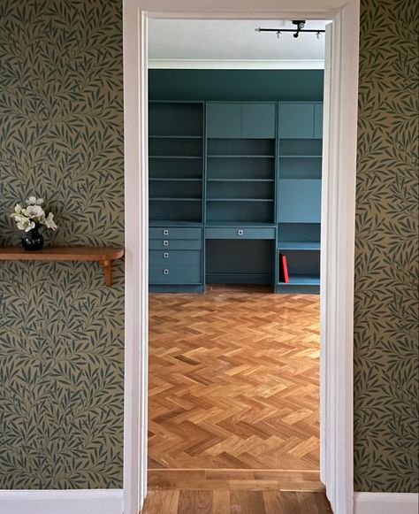 Refinished original parquet floor and G-Plan shelving to match wall colour and entrance hall wallpaper Hallway Ideas Parquet Floor, Hallway With Parquet Flooring, Parquet Flooring Hallway Entrance, Traditional Parquet Flooring, Oiled Parquet Flooring, Hall Wallpaper, Parquet Floor, Wall Colour, Parquet Flooring