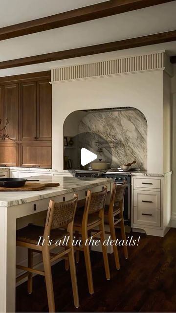 Dawn Berry on Instagram: "Loving the marble trimmed windows, gorgeous mixed media cabinetry, arched hood detail and banquette.  So warm and inviting. 

Design @annaknightinteriors 
Construction @arkwrightconstruction" Arch Over Oven, French Kitchen Hood, Arched Range Alcove, Kitchen Hood Plaster, Window Behind Stove, Arched Range Hood, Kitchen Island Side Panels, Kitchen Oven Hood Ideas, Arched Kitchen Cabinets