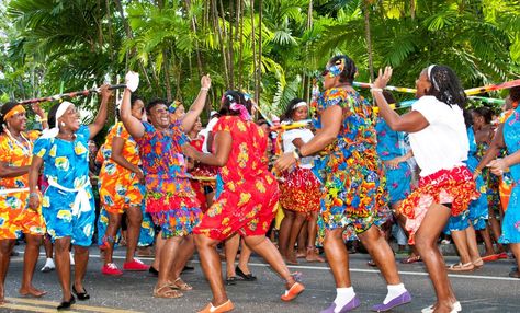 The natives of Seychelles have no custom attire. The clothing are distinctive through their vibrant colors and elaborate patterns. Seychelles Culture, Seychelles People, Seychelles Islands, Fever Pitch, Travel Noire, National Dress, Island Art, African Diaspora, African Countries