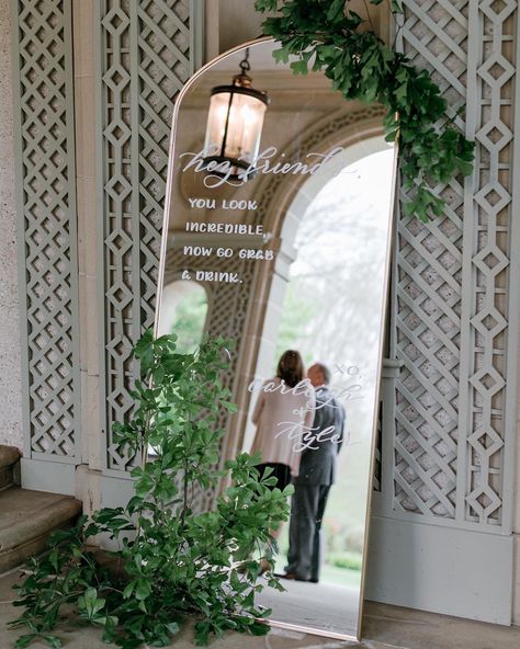 Gold arched mirror with calligraphy by Nob Hill Jane for wedding at Glen Manor House, Portsmouth, Rhode Island | Photo by Constance Schiano | Planning by Soirees and Revelry | Florals by Floral Designs by Justine Wedding Decorations Mirrors, Wedding Mirror Backdrop, Wedding Mirror Full Length, Mirror Wedding Decor Reception Ideas, You Look Good Wedding Mirror, Mirror Ideas Wedding, Mirror Photo Op Wedding, Photo Mirror Wedding, Arch Mirror Welcome Sign Wedding