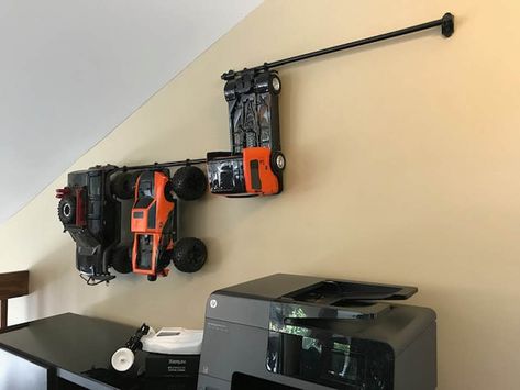 RC Car Wall Hanging Storage Idea Rc Truck Storage Ideas, Ikea Fintorp, Monster Truck Bedroom, Truck Bedroom, Garage Hacks, Rc Rock Crawler, Boys Playroom, Truck Storage, Rc Cars And Trucks