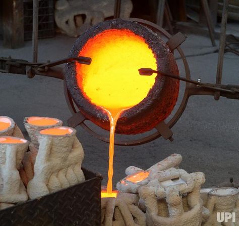 Workers in fire suits pour molten bronze metal into molds during the casting of the Screen Actors Guild Award statuettes at the American… Molten Metal, American Fine Art, Burbank California, Gold For Sale, Sag Awards, Metal Ball, To Cast, Bronze Metal, Kung Fu