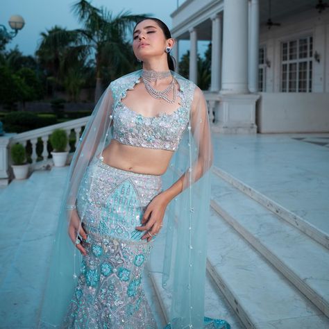 An aquatic vision. Drawing inspiration from the charm of coastal waves this pastel blue mermaid lehenga sets the mood for the seasonal weddings.🌊🐚✨️ Grab the 🧜‍♀️summer siren now at www.mymoledro.com Seen here - Daria Lehenga Set Jewellery - @ghanshyamdaskotawala Shoes - @theheels.india Bags- @forevernoor.india Karvaan ~ a whimsical odyssey #mymoledro #moledro #karvaan #reels #fashion ( fashion, saree, lehenga, co-ords, luxury, ethnic, contemporary, bollywood, trendy, makeup, styling, w... Mridul Sharma, Mermaid Lehenga, Seasonal Weddings, Vision Drawing, Saree Lehenga, Blue Lehenga, Blue Mermaid, Trendy Makeup, Co Ords