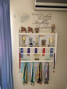 Medals And Certificates Display, Ribbon And Trophy Display Ideas, Trophy Ribbon Display Ideas, How To Display Ribbons And Medals, Display Awards Ideas, Trophy And Metal Display Ideas, Trophies Display Ideas, Basketball Trophy Display Ideas, Medal And Ribbon Display Ideas