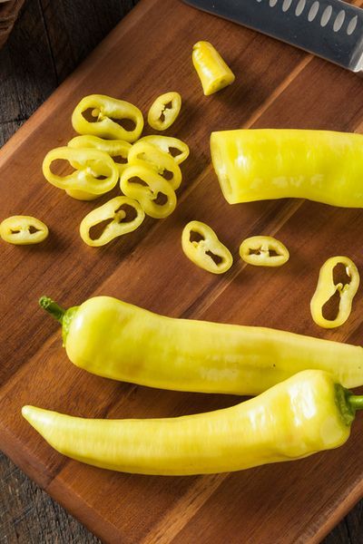 How to Can Bananana Pepper Rings so that you can enjoy the taste of pickled banana peppers on pizza or sandwiches all year long! Mild Pepper Rings Recipe, Canned Banana Pepper Rings, How To Can Banana Pepper Rings, Canning Banana Peppers Rings Crunchy, How To Can Banana Peppers, Pepper Rings Canning, Canning Banana Peppers Rings, Pickled Banana Peppers Recipe Canning, Canned Recipes