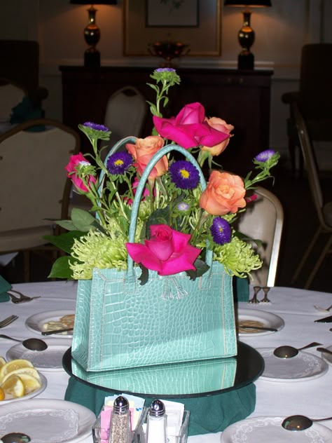 Fashion Show Table Centerpieces, Floral Party Centerpieces, Hat Floral Arrangements, Flower Arrangement In Purse, Ladies Luncheon Ideas Table Decorations Centerpieces, Womens Conference Table Decor Centerpiece Ideas, Purse Theme Party Ideas, Purse Floral Arrangements, Purse Bingo Table Decorations