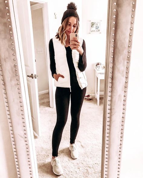 White puffer vest with black leggings and a black pom pom beanie for a cozy athleisure outfit - perfect for running errands White Puffer Vest Outfit, Black Leggings Outfit Ideas, Puffy Vest Outfit, White Vest Outfit, Cozy Athleisure, Leggings Outfit Ideas, Puffer Vest Outfit, Vest Outfits For Women, Athleisure Outfit