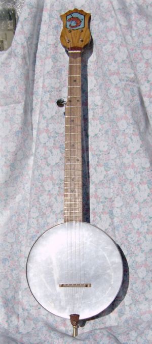 Howdy Ya Dewit!: How to Build a Cookie Tin Banjo Diy Banjo How To Make, Diy Banjo, Allotment Planning, Banjo Building, Cigarbox Guitar, Music Instruments Diy, Build Your Own Guitar, Homemade Musical Instruments, Banjo Music