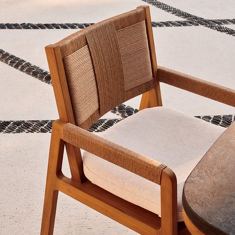 Roc Modern Teak and Rattan Outdoor Dining Armchair with White Sunbrella Cushion | CB2 Black Metal Dining Chairs, Modern Outdoor Dining Chairs, Metal Outdoor Chairs, Gold Dining Chairs, Molded Chair, Blue Dining Chair, Rattan Outdoor, Woven Chair, Rattan Dining