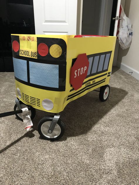 Turn your wagon into a fun school bus for your toddler. School Bus Wagon Costume, Bus Halloween Costumes, Struggle Bus Costume, Sesame Street Wagon Halloween, Wagon Halloween Costumes, Wagon Costume, Energy Bus, Struggle Bus, Fun School