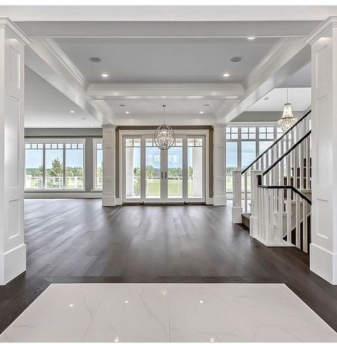 White living room with floor to ceiling windows, french doors, coffered ceiling, molding moulding millwork. Dark wood plank flooring. Hamptons style home. Home design decor inspiration ideas. درج السلم, Hamptons Style Homes, Staircase Wall Decor, Hamptons Style Home, Wood Plank Flooring, Dekorasi Kamar Tidur, White Living, White Living Room, Floor To Ceiling Windows