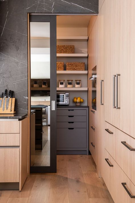 Having a walk-in pantry with additional cooking appliances and storage was really important in the design for these homeowners. They liked an idea they saw in our showroom to close off the extended pantry with a Schmalenbach sliding pocket door when not in use.⁠ Walk In Pantry Sliding Door, Pocket Doors Kitchen Pantry, Kitchen Pantry Sliding Door, Pocket Door Pantry Kitchen, Walk In Pantry Doors, Hidden Pantry Walk In, Pocket Door Pantry, Chris Olsen, Modern Kitchen Pantry