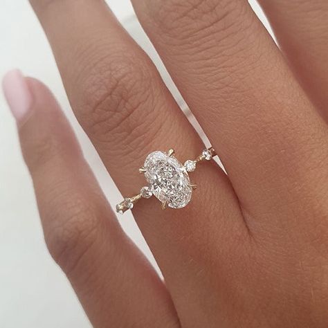 ✥ Introducing our exquisite 1.50ct Elongated Oval Cut Moissanite Petite Pave Engagement Ring, a true masterpiece of refined beauty. The elongated oval cut moissanite centerpiece, weighing 1.50ct, exudes a timeless allure and mesmerizing sparkle. Adorned with a delicate pave band, meticulously set with tiny shimmering s Pretty Engagement Rings, Elongated Oval, Cute Engagement Rings, Moissanite Bridal Sets, Future Engagement Rings, Oval Engagement, Dream Engagement Rings, Beautiful Engagement Rings, Bridal Bands