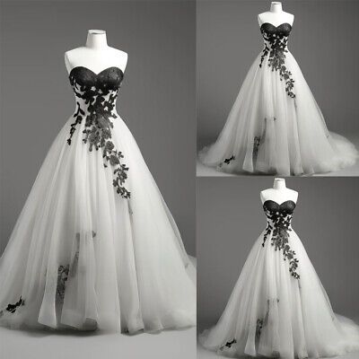 White Wedding Dress With Burgundy Accents, Wedding Dress With Black Details, Black Bridal Bouquet Brides, Black And White Wedding Dress Ballgown, Butterfly Dress Wedding, Wedding Dress White And Black, Black And White Wedding Dress Corset Victorian Ball Gowns, White And Black Wedding Dresses, Black Accent Wedding Dress