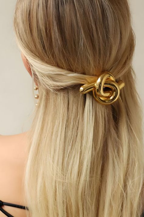 Glossy loops intertwine to create this stunning hair clip, poised to be the new bestseller in your collection. Crafted with care in NYC, it adds a touch of contemporary elegance to any hairstyle. Find out more trendy accessories in this Lelet Ny guide on Marmalade. 🗽✨ #ValentinesGiftIdeas #FashionistaGifts #HairAccessories #GlossyKnotBarrette #ValentinesDayStyle #LeletNy #MarmaladeGuide #FashionGifts Lelet Ny, Knot Hair, Gold Plated Jewellery, Tarnished Jewelry, Let Your Hair Down, Melbourne Victoria, Dongguan, Gold Accessories, Elegant Accessories